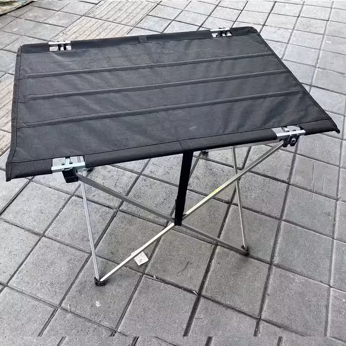 میز تاشو مسافرتی با اسکلت ضربدری و رویه برزنتی تقویت شده  کم جا و سبک کد8 | amazonchi