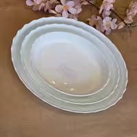 تابه پیرکس بیضی سه تکه مدل تریانون، با طرح کنگره گلدن