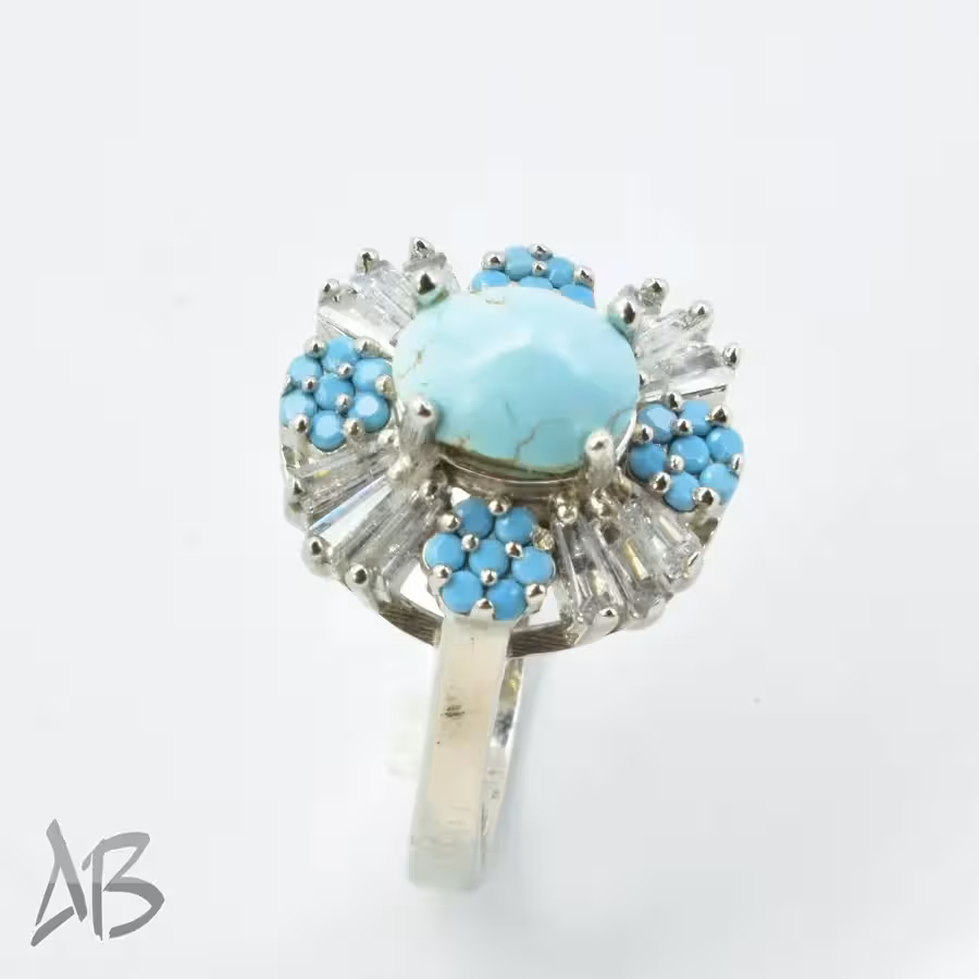 انگشتر نقره زنانه فیروزه نیشابور اصل عیار 925 با تزئین نگین‌های ریز رنگی آقابزرگ کد 692