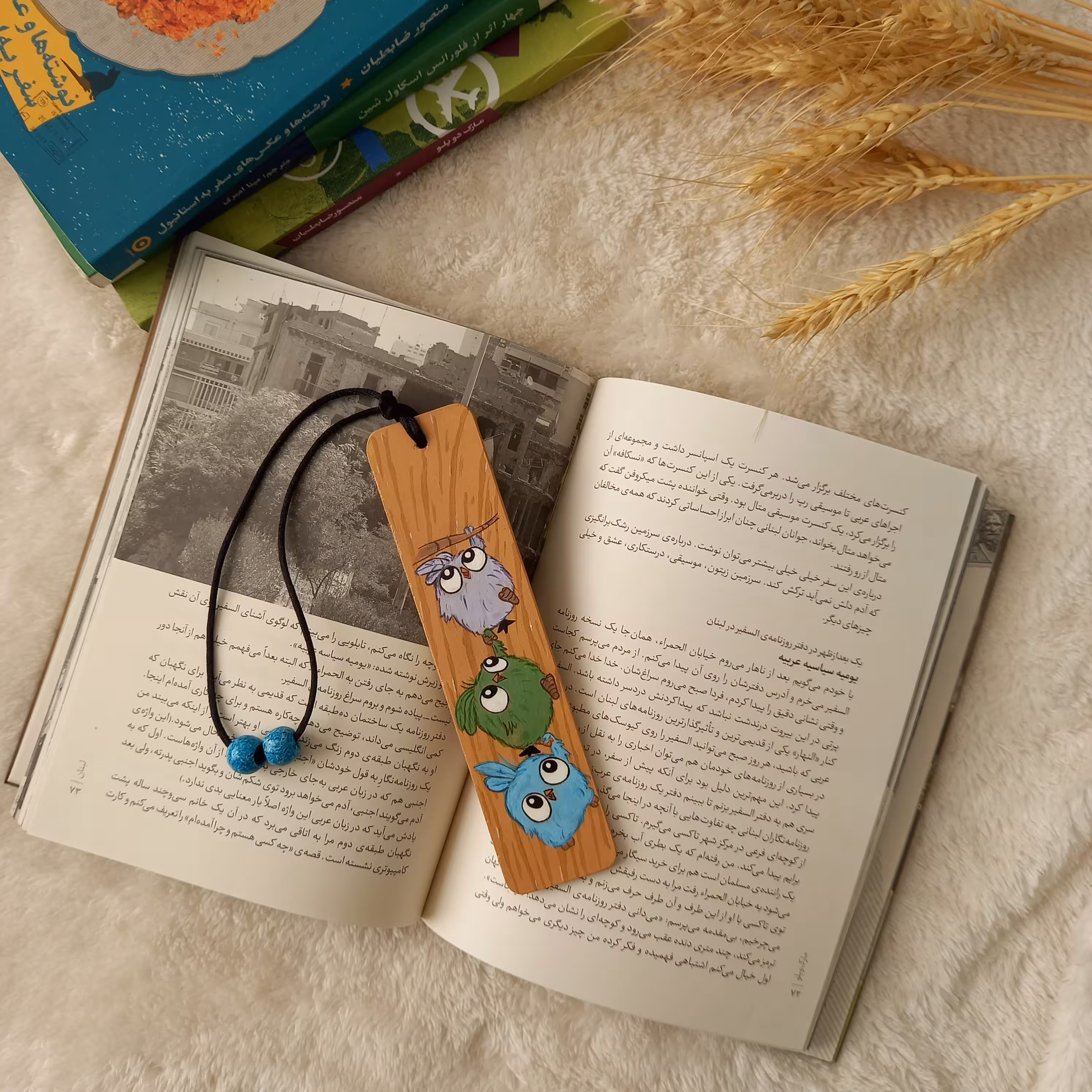 بوک مارک یا نشانگرکتاب سایزتقریبا 17 نقاشی شده با دست طرح پرنده های رنگی 