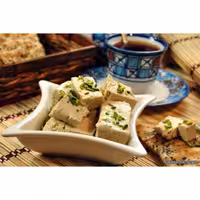 حلوا(شکری)(ترکیب شکرسفیدنیشکر وارده کنجد)وزن(500گرم)