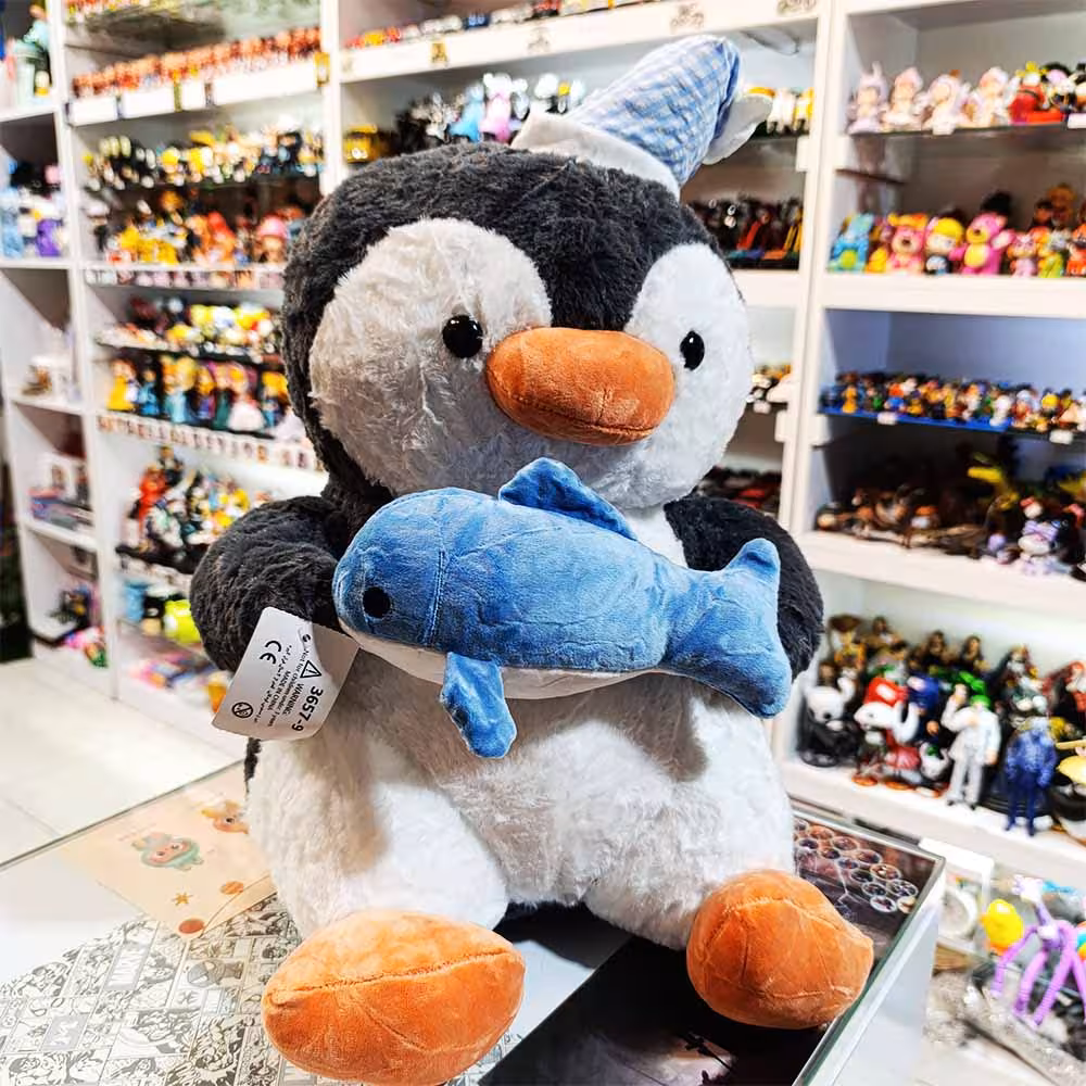 عروسک پولیشی پتو دار پنگوئن ماهی به دست