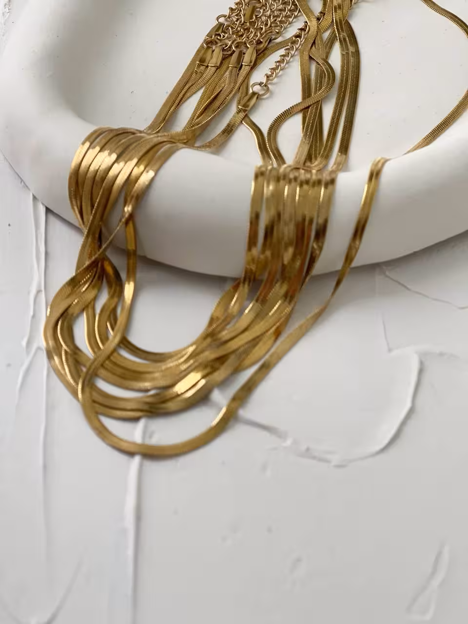 گردنبند زنانه و مردانه مدل ماری دارای رنگبندی طلایی مشکی نقره ای