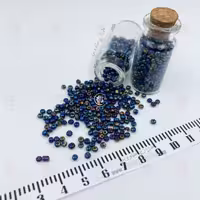 منجوق * متوسط * بسته 40 گرمی ( پر طاووسی )