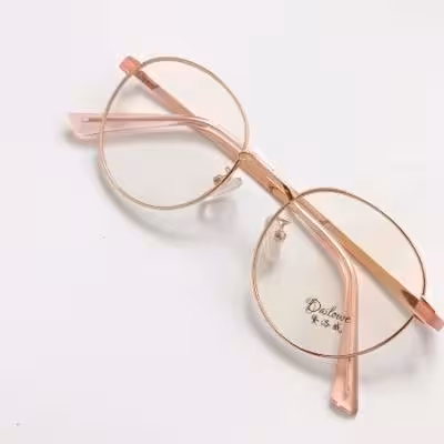 عینک طبی گرد فلزی عینک طلایی