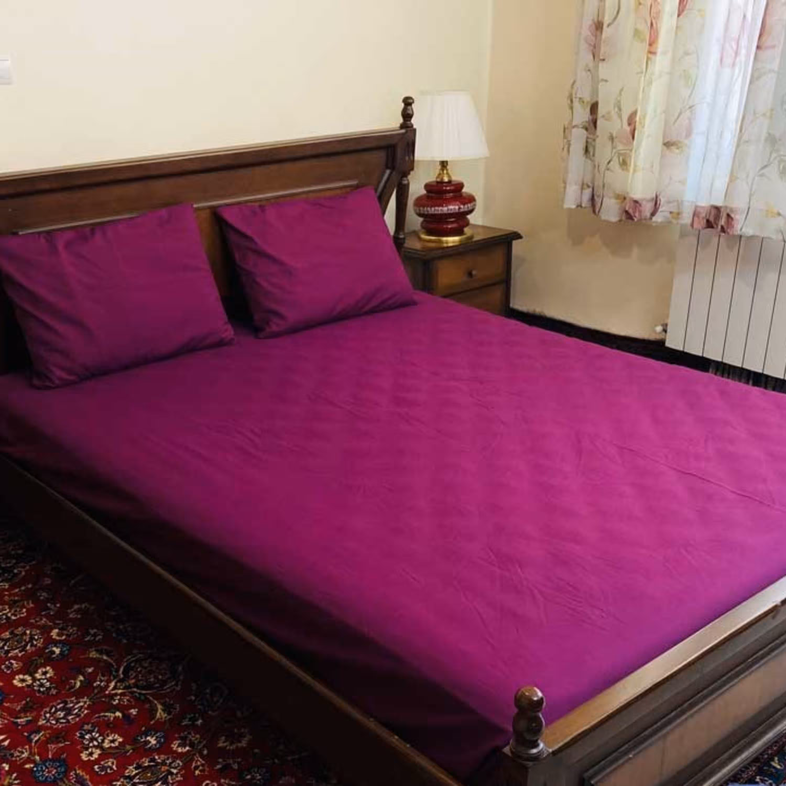 ملحفه کشدار تترون ساده دونفره عرض180 (رنگ بادمجونی)