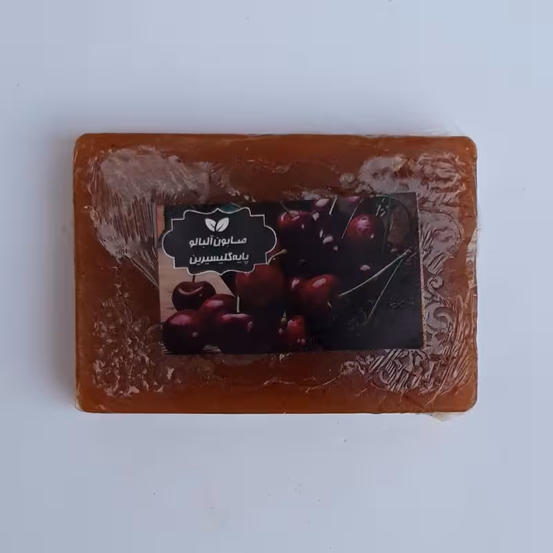 صابون آلبالو گلیسرینه موسسه پژوهشی طبی بازرگانی سیمرغ (کمک به رفع لک، کک و مک، احیا، نرم و روشن، مرطوب، شفاف، صاف کننده)