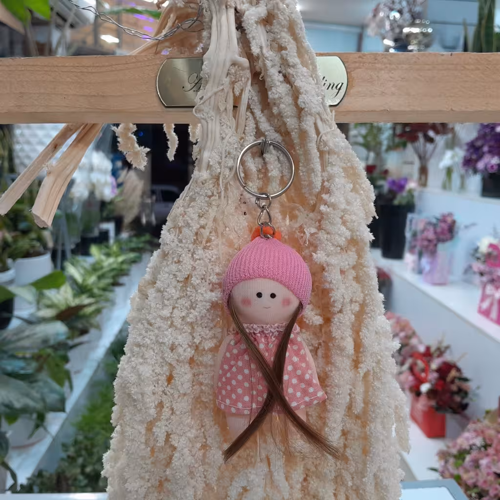 عروسک سرکلیدی دختر پیرهن صورتی