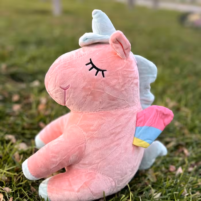 عروسک یونیکورن رنگ صورتی طرح نشسته سایز35 سانتی  