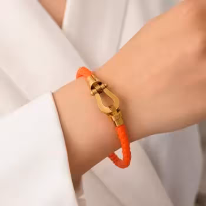 دستبند نارنجی چرمی فرد اصلی . (FRED حک شده روش). کد D399..