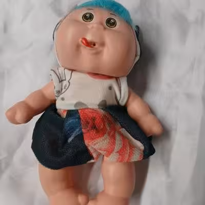 عروسک قد 22 سانت دست و پا پیچش دارد