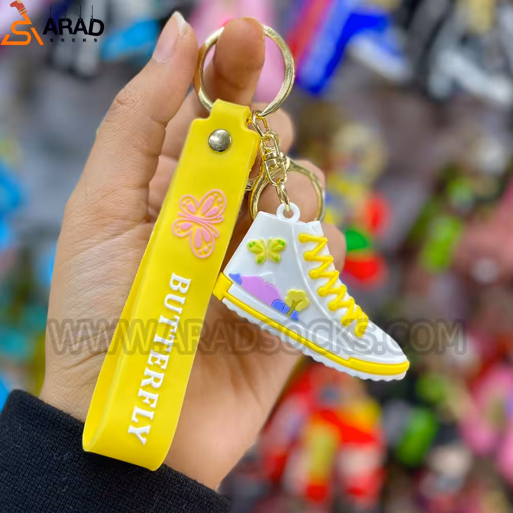 جاکلیدی سیلیکونی طرح کتانی زرد