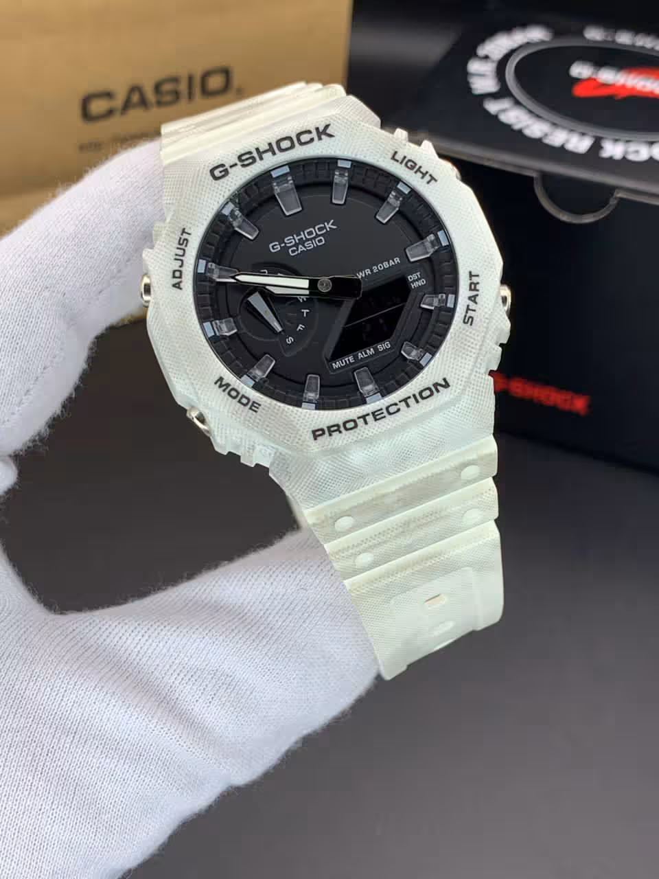 ساعت مچی کاسیو جیشاک مدل GA-2100 صفحه مشکی دور شفاف بند سفید