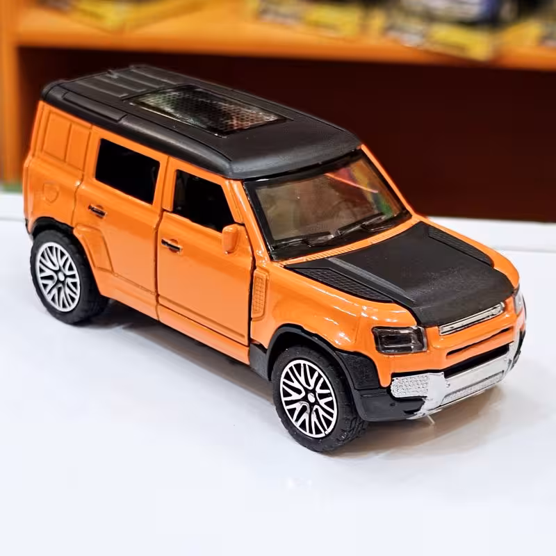 ماشین فلزی لندرور دیفندر نارنجی 12 سانتی کد 10892