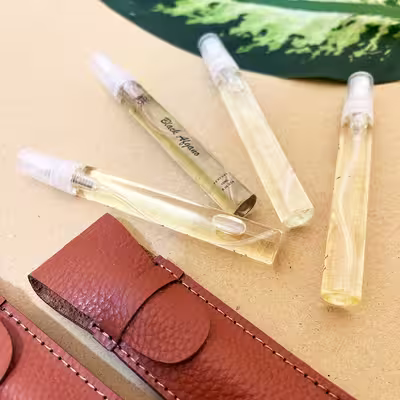 عطر جیبی مردانه ریر مدل ناسوماتو بلک افغان حجم 10 میلی لیتر