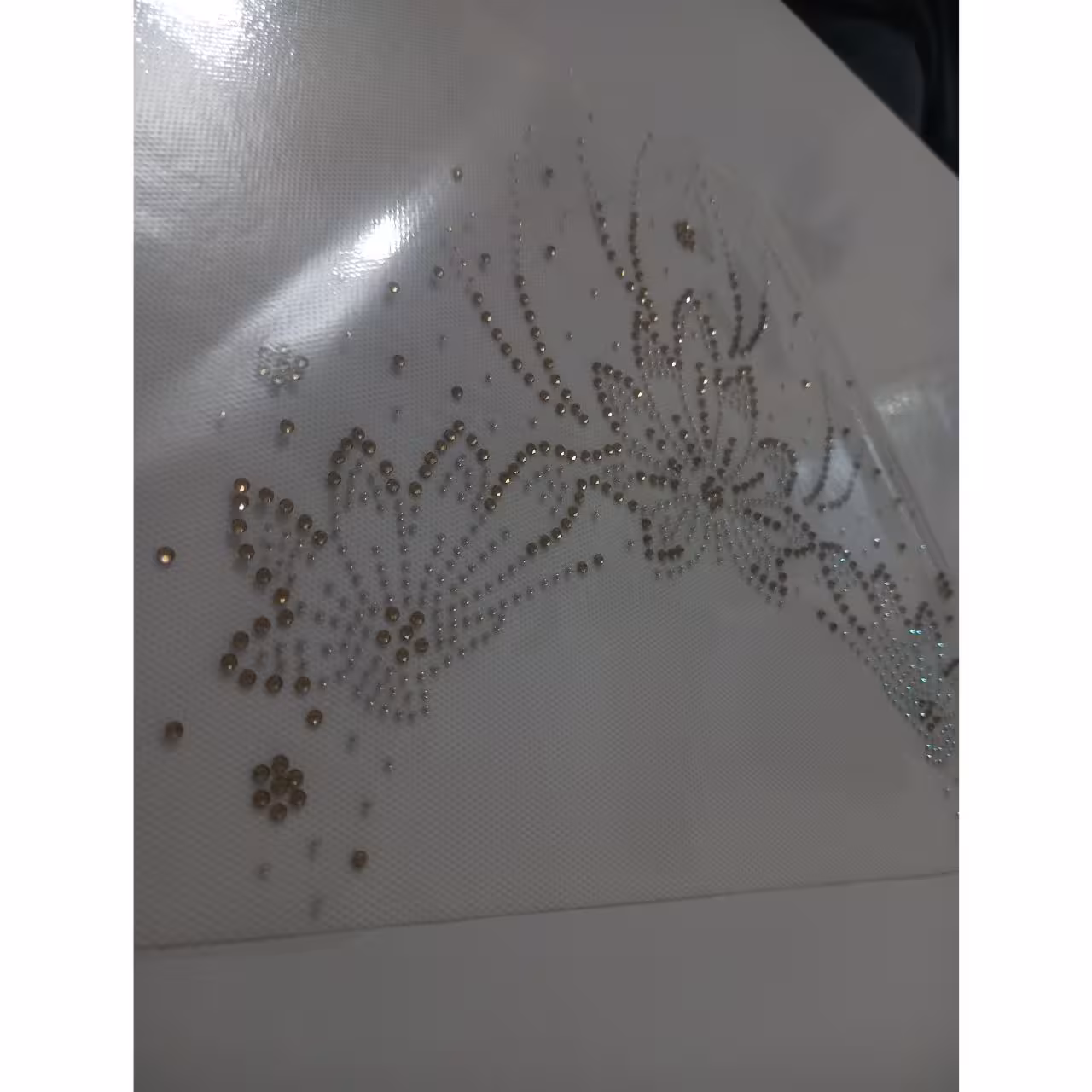 نگین حرارتی طرح یقه گرد گل . چادر . نگین چادر . مانتو . نگین چسبی . جوراب 