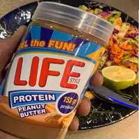 کره بادام‌زمینی 555 گرمی  Whey با طعم شکلات-چند رنگ