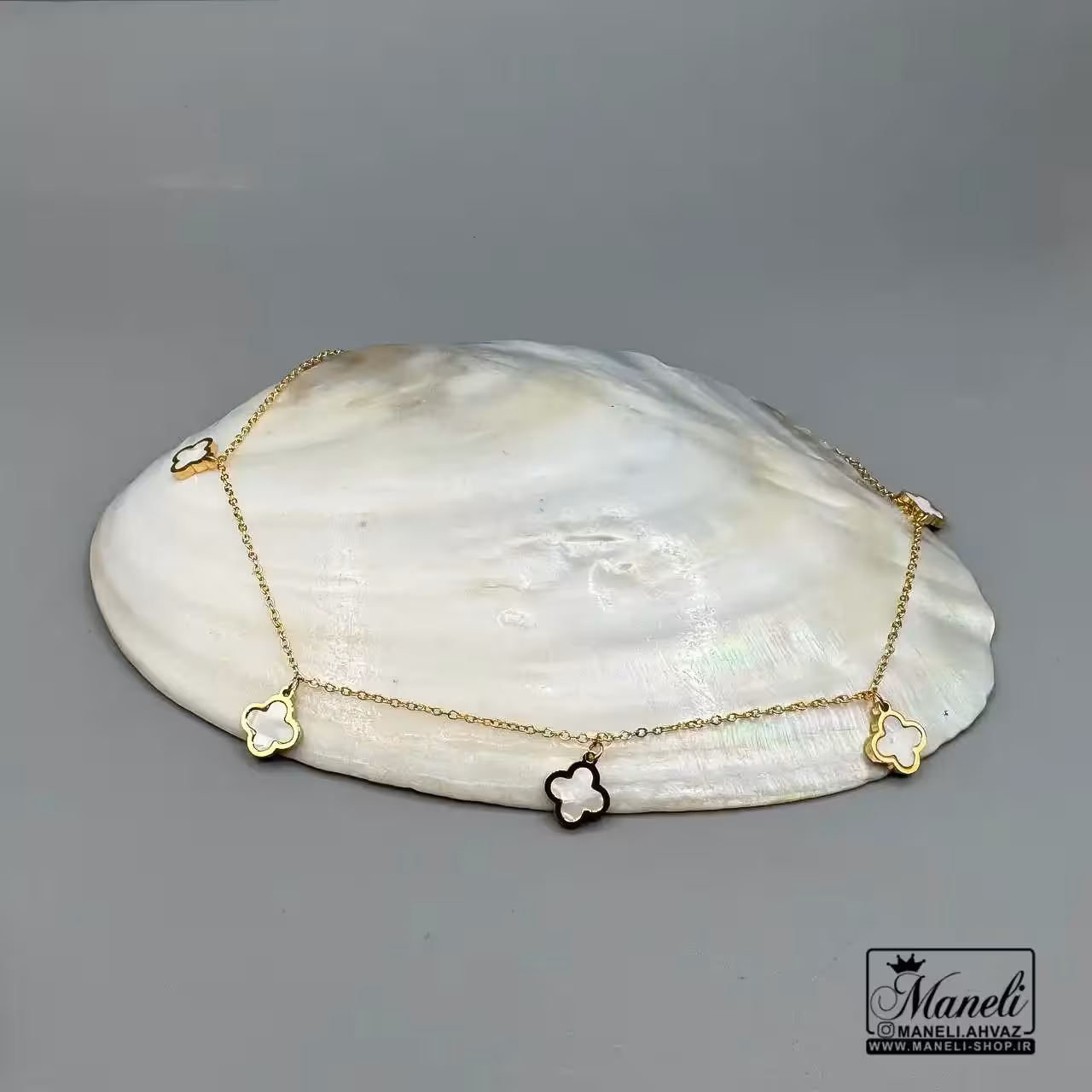 گردنبند هفت گُل طلایی با سنگ سفید (ونکلیف)