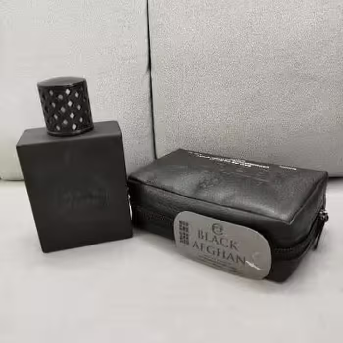 عطر ادکلن بلک افغان 100 میل ( به همراه کیف چرمی)