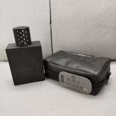 عطر ادکلن بلک افغان 100 میل ( به همراه کیف چرمی)