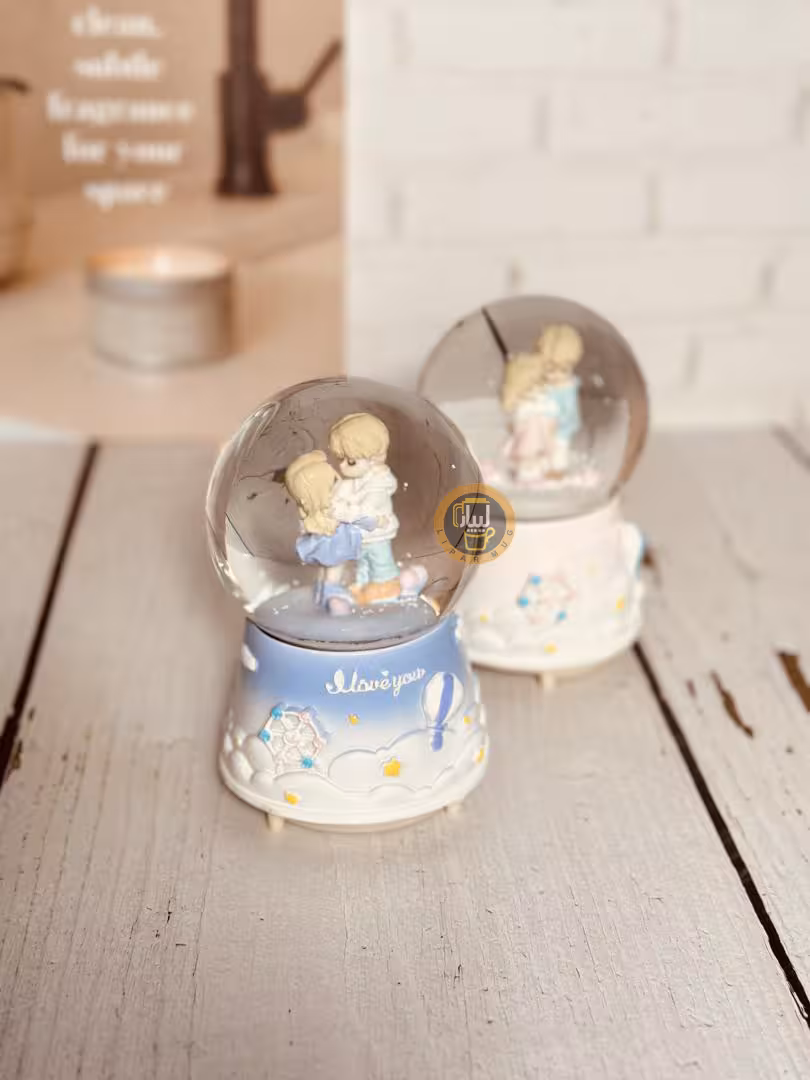 گوی موزیکال پمپی چراغدار بزرگ طرح دختر و پسر دلبر کد 6865