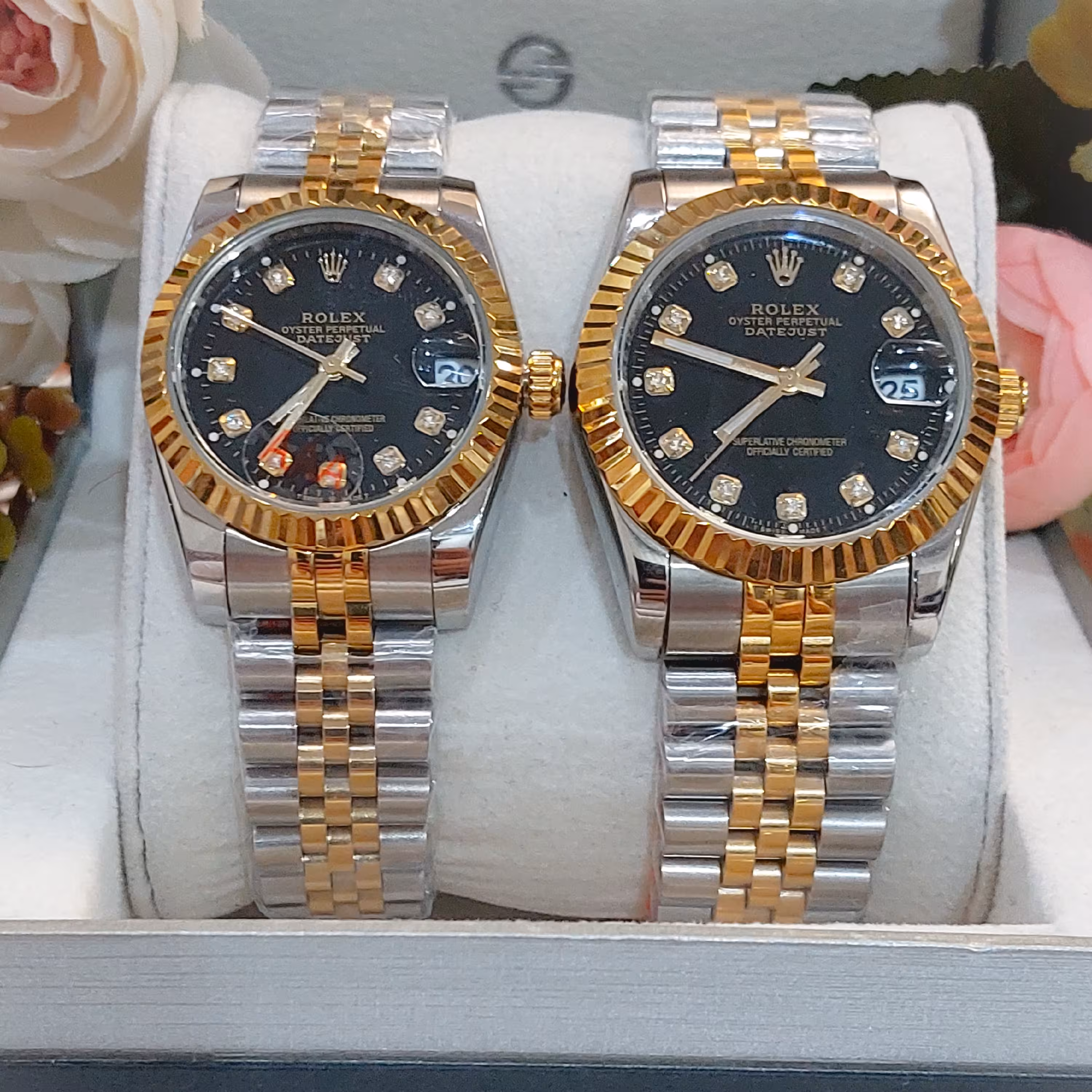 ساعت مچی ست زنانه ومردانه رولکس موتورژاپن اصل دورنگ صفحه مشکی