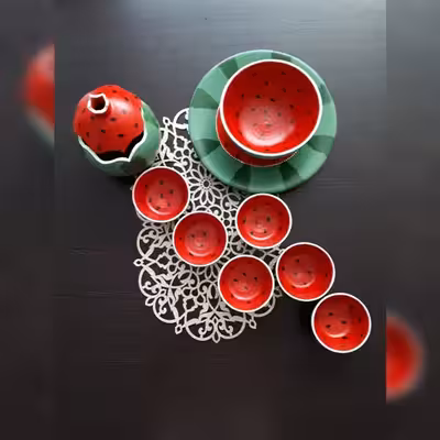 ست 9 تکه ظروف پذیرایی سفالی طرح هندوانه کد 00090