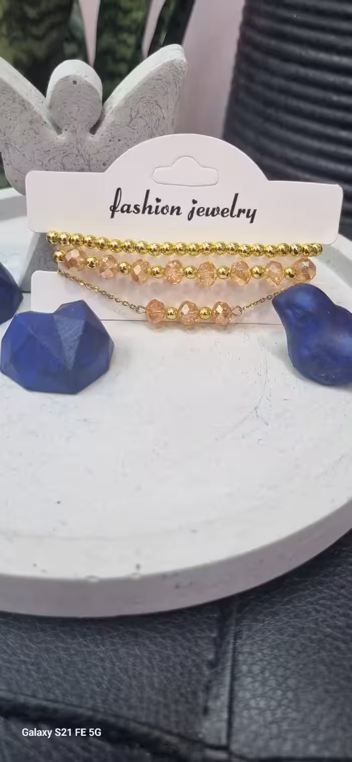 دستبند 3 لاین کریستال و حدید طلایی