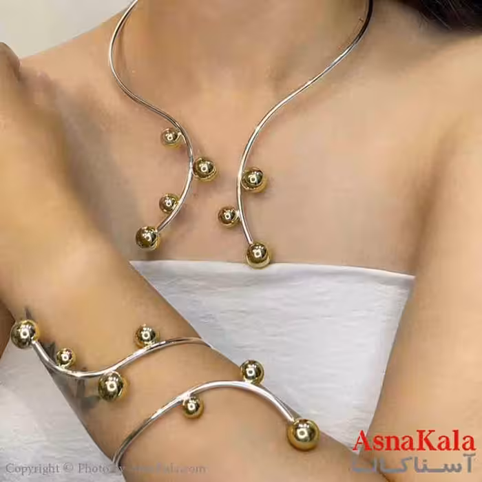 نیم ست زنانه پینترستی  شامل گردنبند و دستبند طرح یک پیچ و گوی  ترند رنگ نقره ایی کد NIM14906W