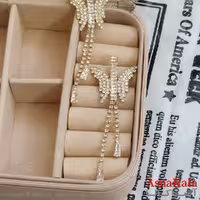 گوشواره جواهری مدل آویز نگیندار رنگ طلایی کد GSH152110W