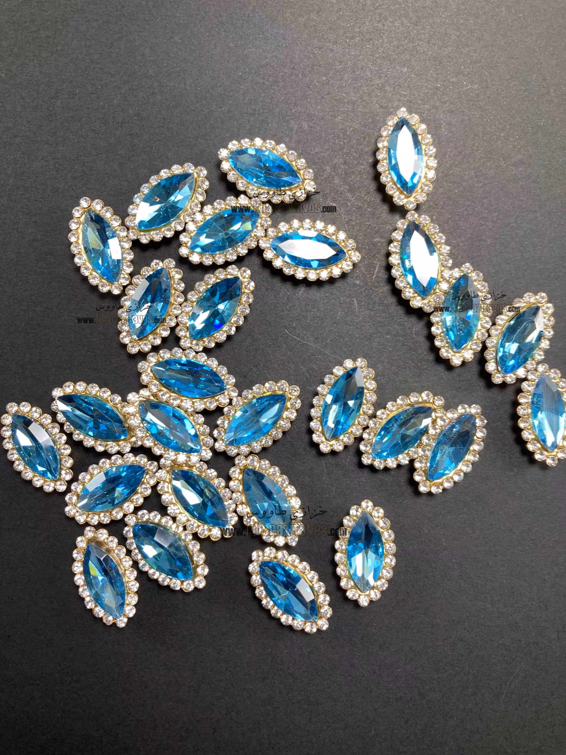 سنگ چشمی دور نگین 7 در 15  ( فیروزه ای )