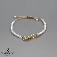 دستبند مرواریدی و پلاک طلا تیفانی تایتان مروارید سفید