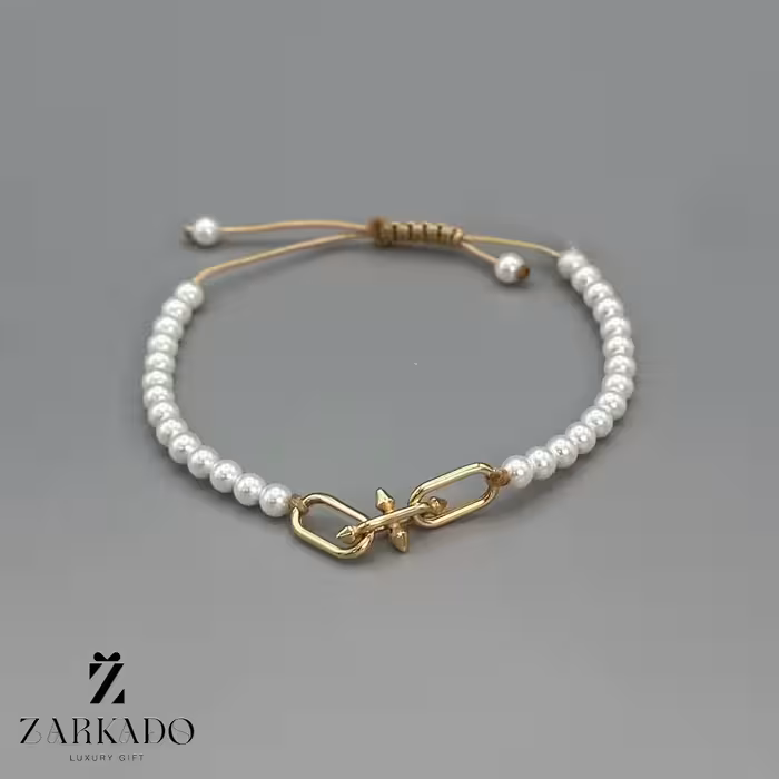 دستبند مرواریدی و پلاک طلا تیفانی تایتان مروارید سفید