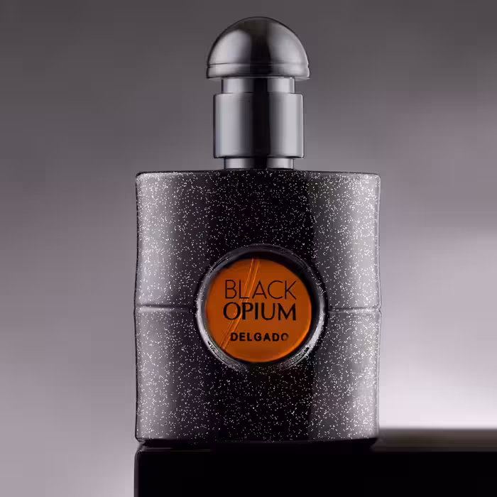 ادکلن جیبی زنانه دلگادو مدل بلک اپیوم Delgado perfume, model BLACK حجم 25 میلی لیتر