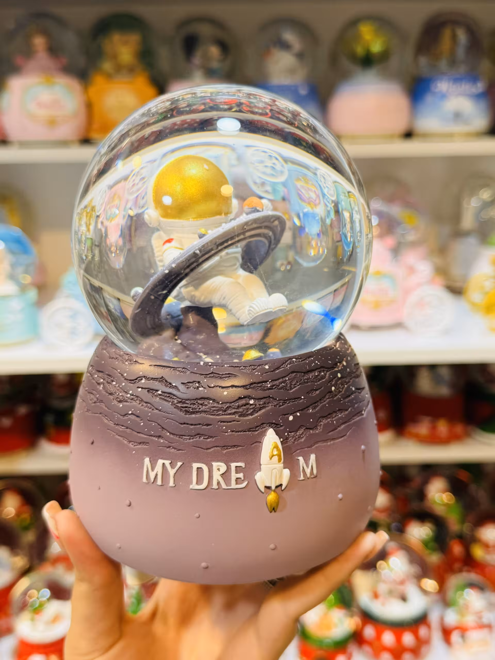 گوی موزیکال فضانورد بنفش A