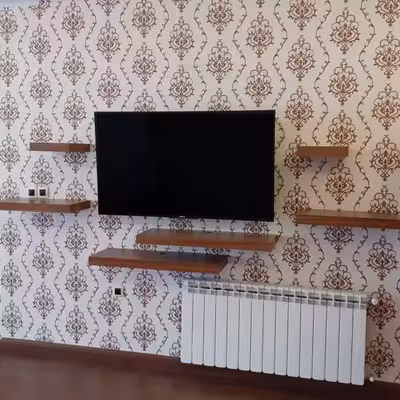 پایه دیواری تلویزیون مدل A43sia مناسب برای تلویزیون های 43 تا 65 اینچ