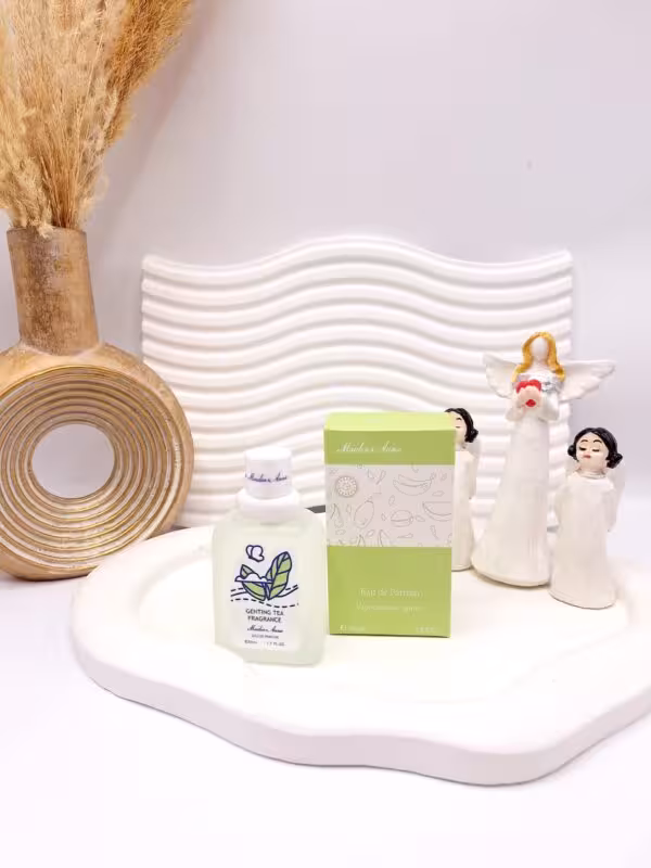 عطر بیکینی رایحه برگ درخت چای سبز حجم 50 میل برند میدن آنا کد E188-4