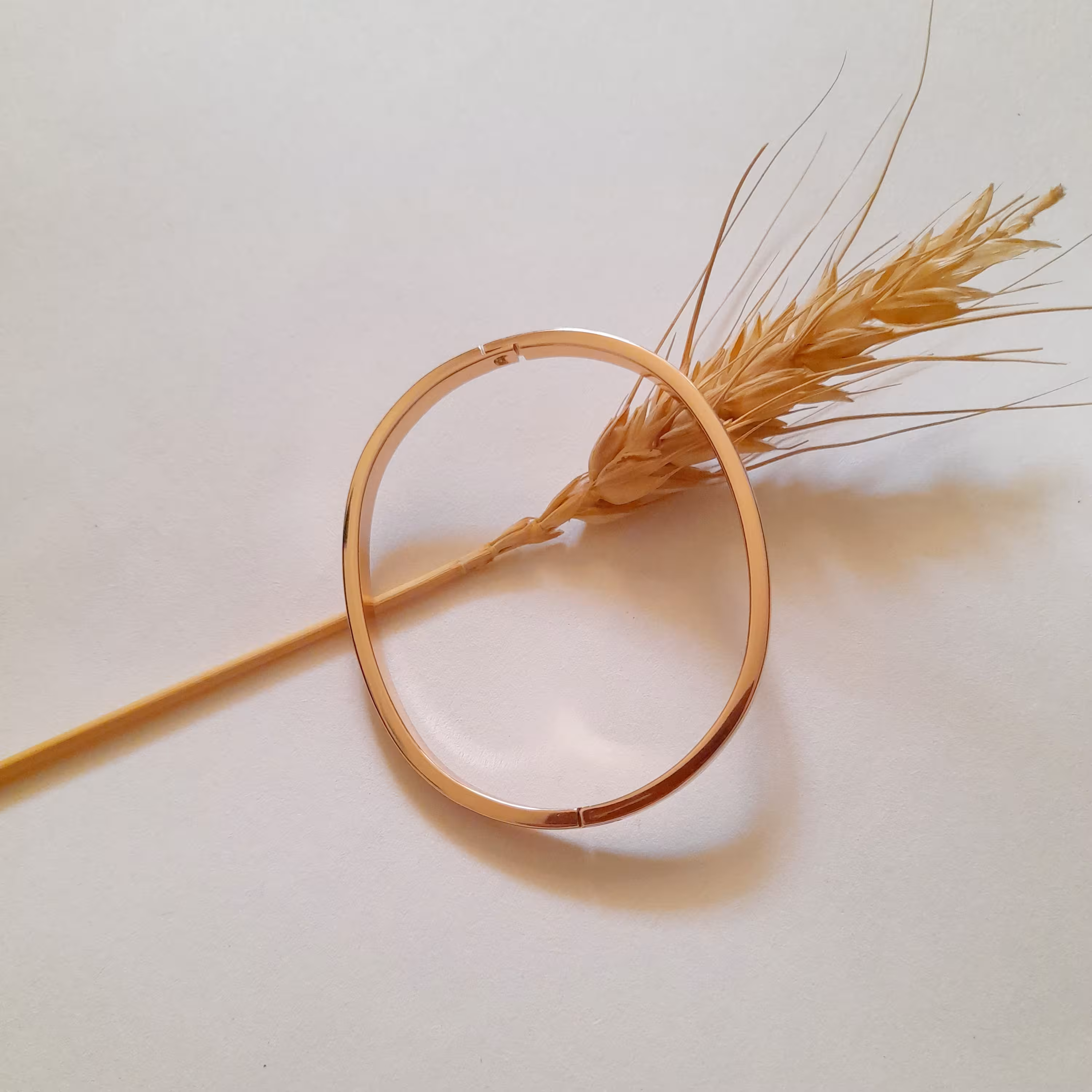 دستبند ژوپینگ النگویی با آبکاری طلا رنگ ثابت