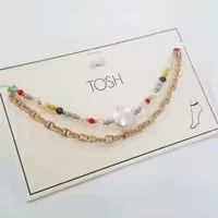 پک دو عددی پابند کار شده با مروارید باروک درشت از برند آلمانی TOSH
