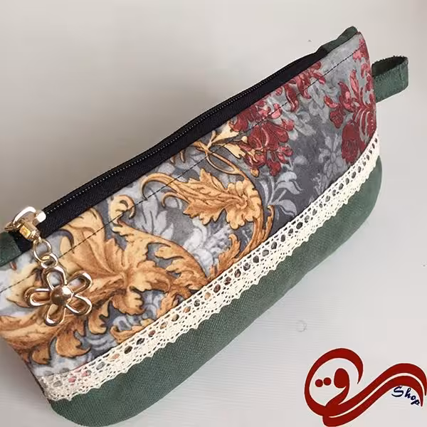 جامدادی پارچه ای زمینه سبز گل زرشکی طلایی