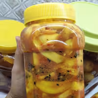 ترشی انبه نیمه تند خانگی 1 کیلوگرم