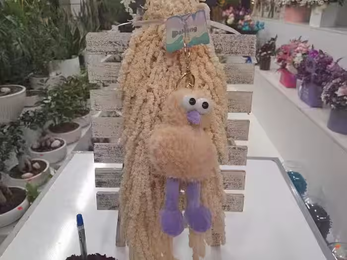 عروسک جوجه چشم درشت کرمی
