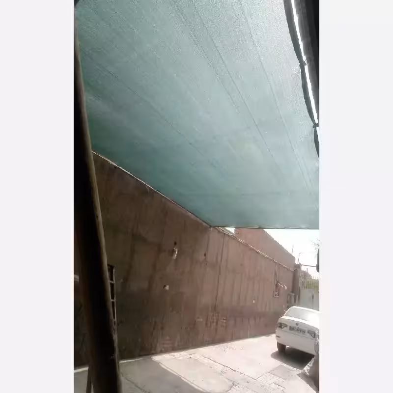 شید سایبان 80 درصد 7 در 9 متر دوردوزی شده همراه با حلقه نصب