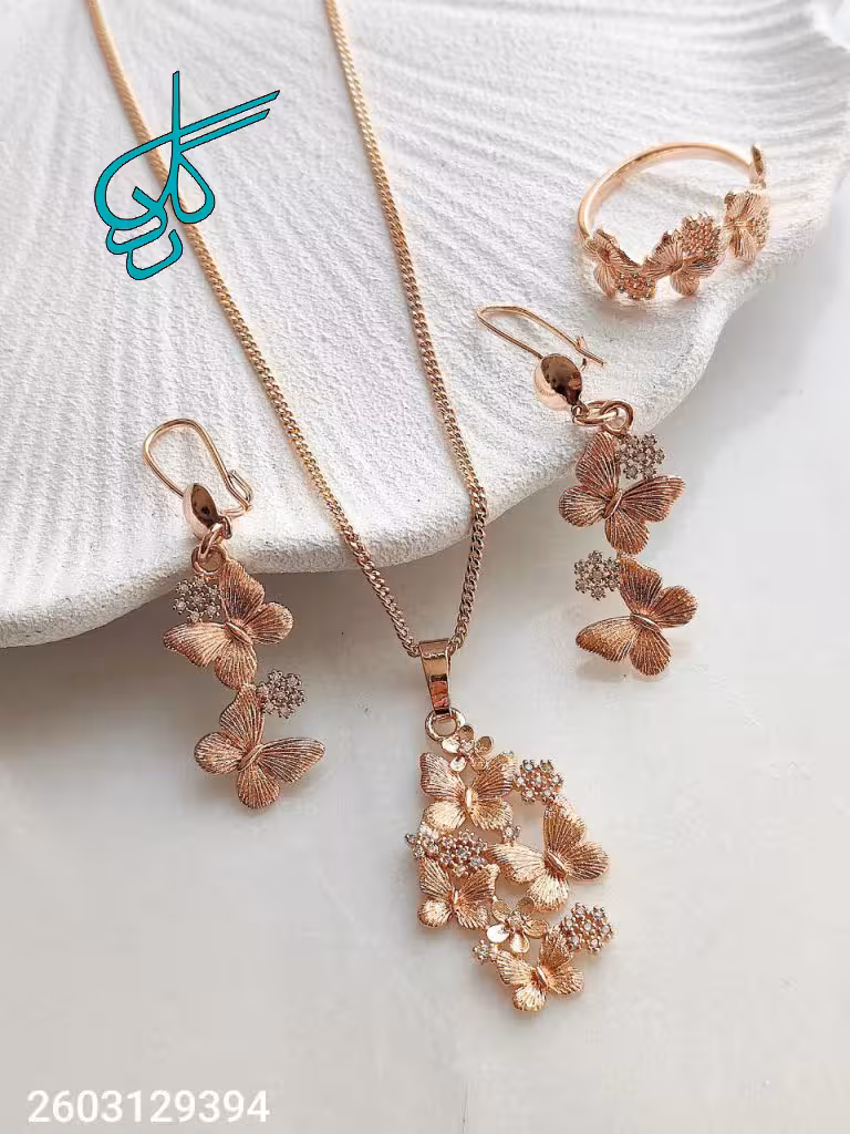 خرید نیمست زنانه جدید و شیک همراه با انگشتر مدل گل و پروانه مارک ژوپینگ رنگ ثابت ضد حساسیت آبکاری شده کیفیت عالی کد 1715532 - ردگل