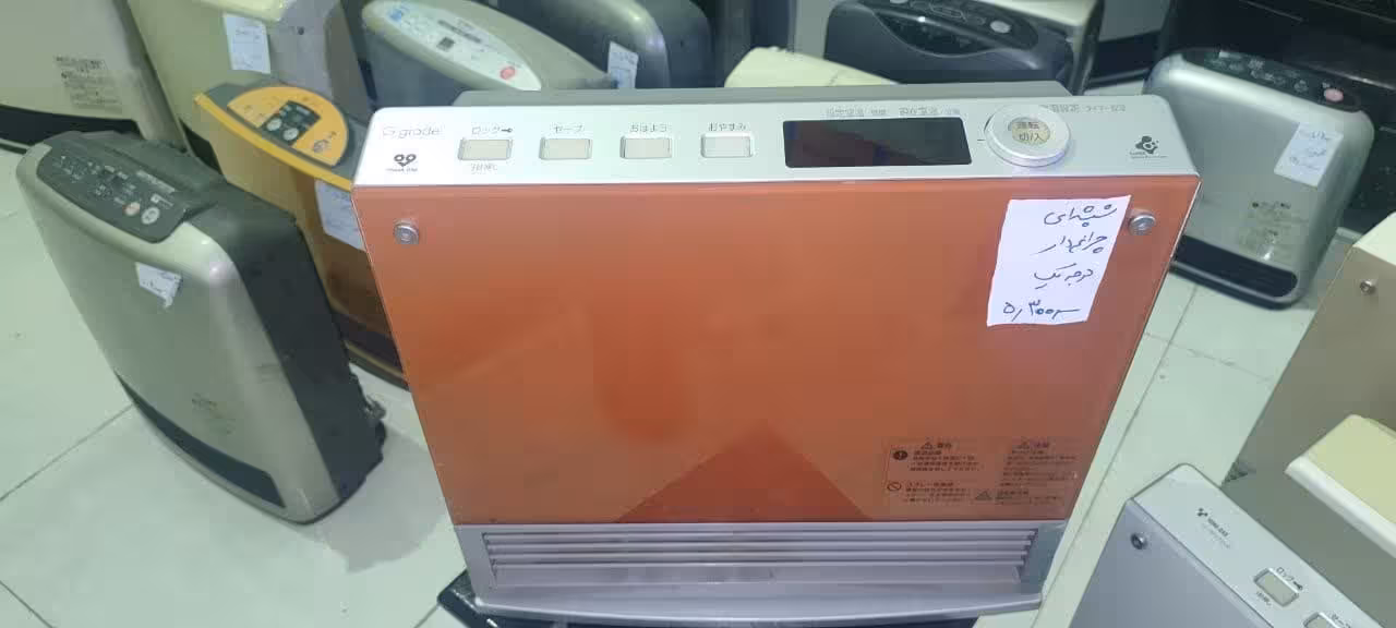 بخاری ژاپنی گازی شیشه ای چراغ دار 2500 وات دست دوم