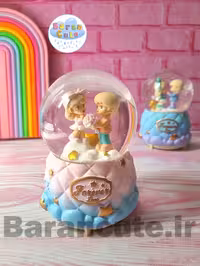 گوی موزیکال پمپی برفی چراغ دار سایز بزرگ طرح پرنسس دختر و پسر و دسته گل
