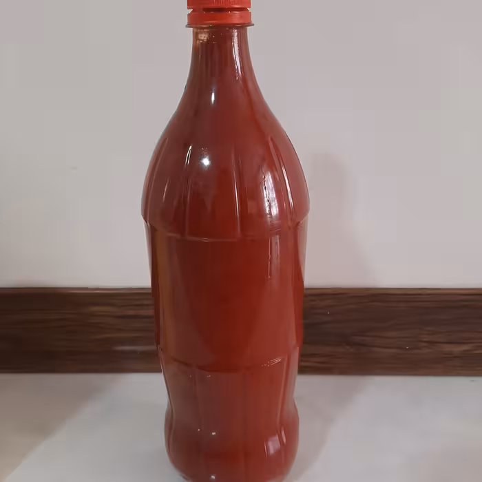 رب گوجه فرنگی خانگی بدون افزودنی های غیر مجاز  با طعمی خوب و رنگی بسیار عالی