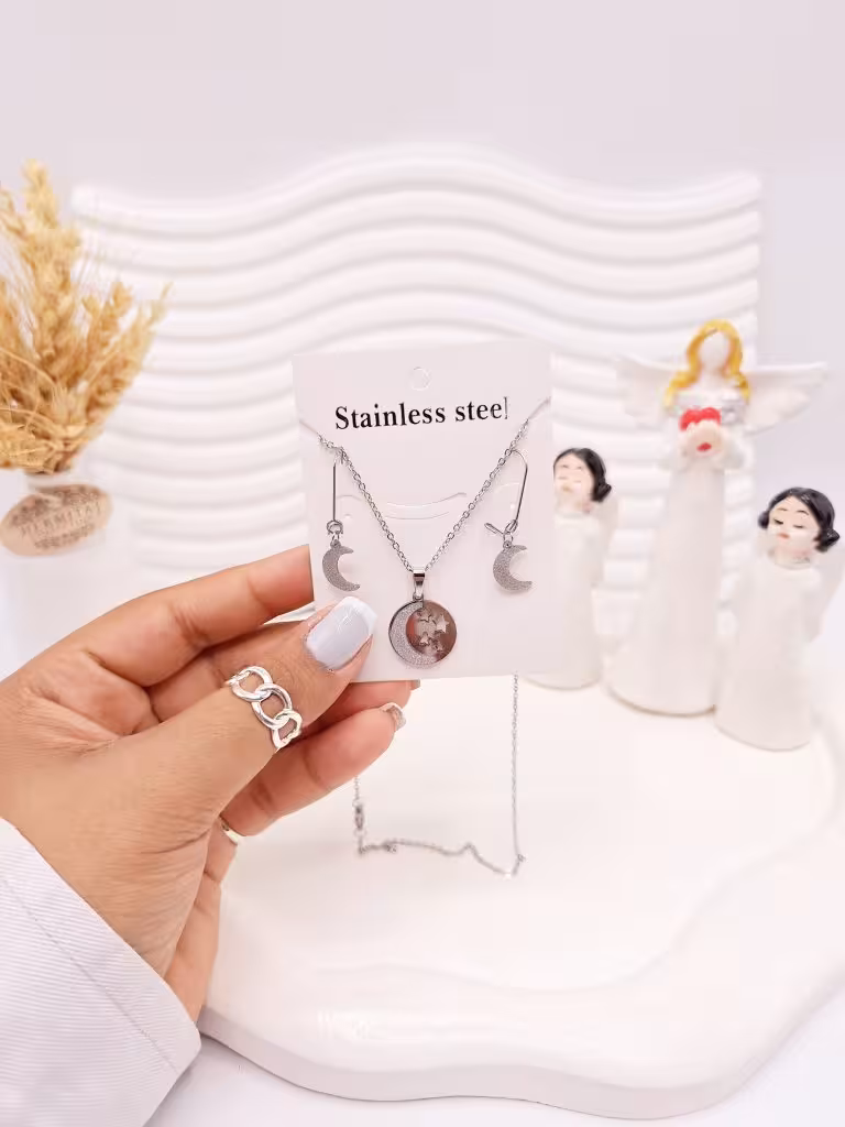 ست گوشواره و گردنبند طرح ماه و ستاره نقره ای استیل