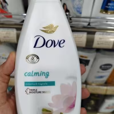 شامپو بدن داو Dove مدل calming آرامش بخش رایحه پسته و مگنولیا