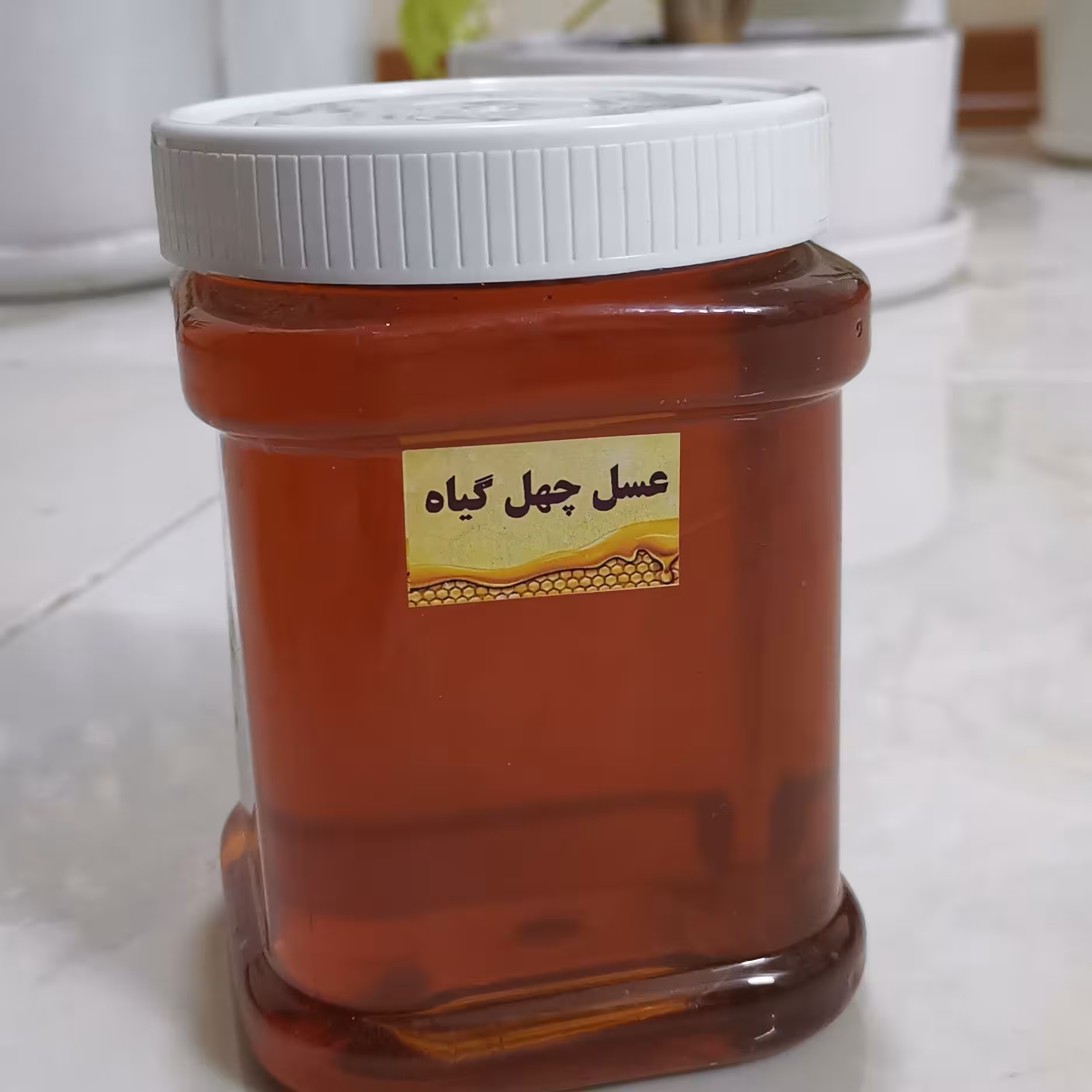 عسل چهل گیاه 1 کیلویی